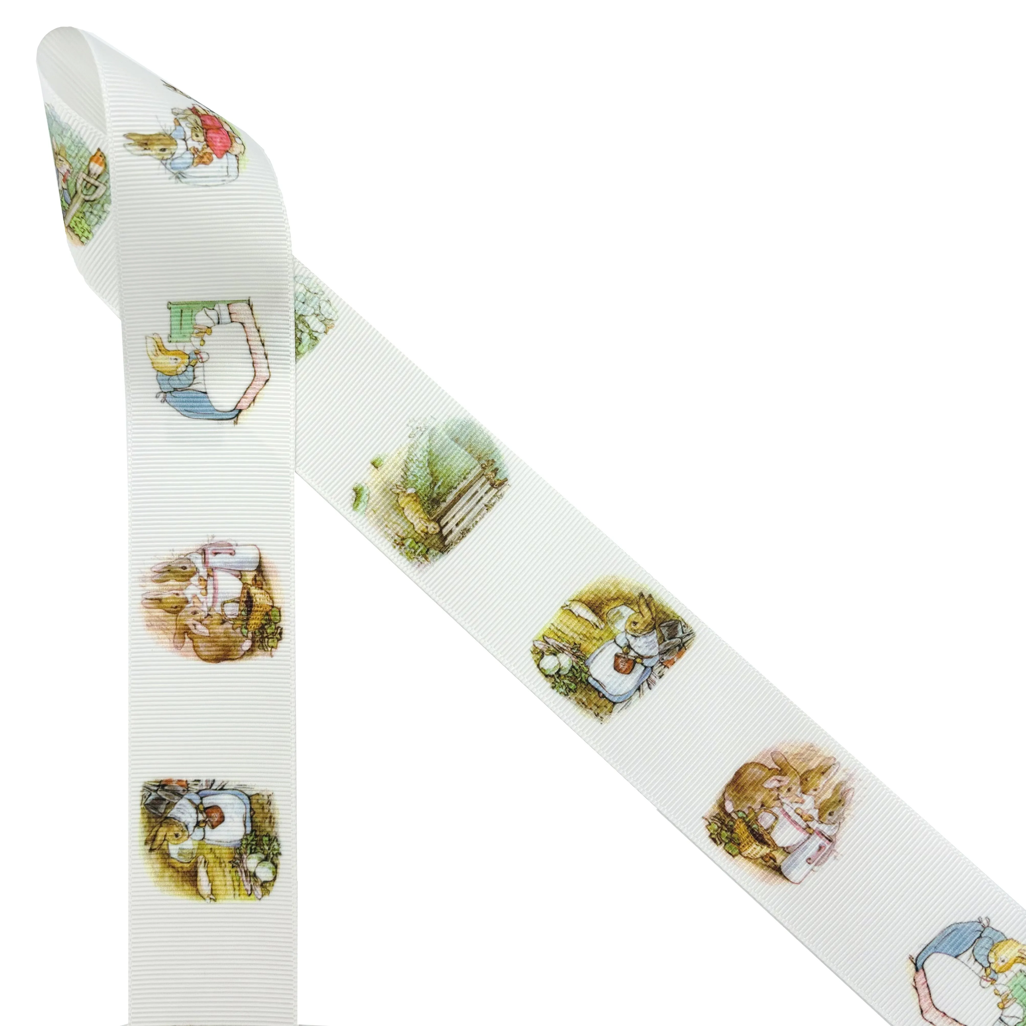 Bunny ribbon, rabbits in a blue jacket of storybook fame printed on 1.5" white satin and grosgrain